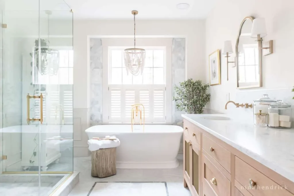 Bright elegant bathroom with freestanding tub